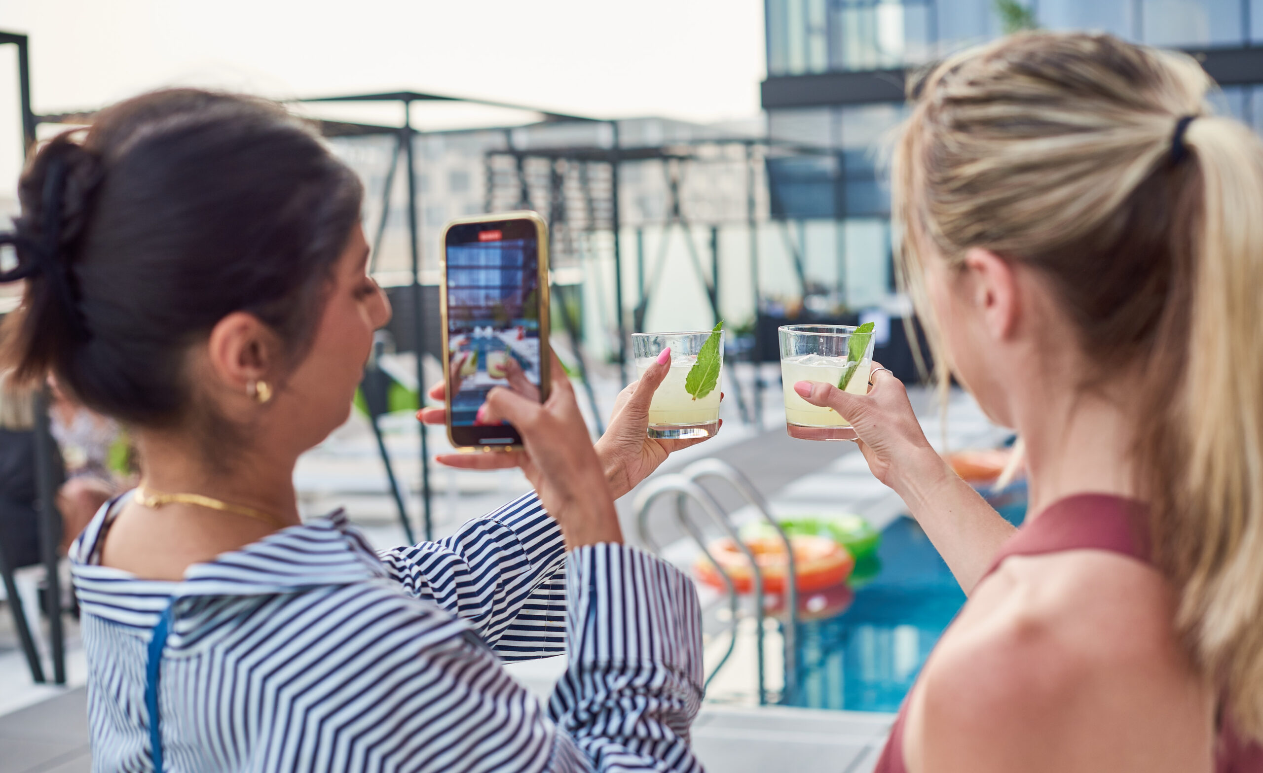 Women Taking Photo of Drinks